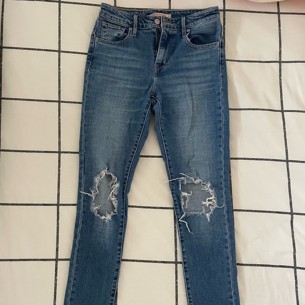 Levi’s 721 High Rise Skinny Ripped Jeans